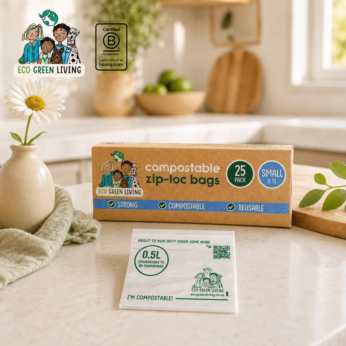 A box of Eco Green Living compostable zip-loc bags, 25 pack, small size, displayed on a kitchen counter next to a daisy in a vase and a compost confirmation card.