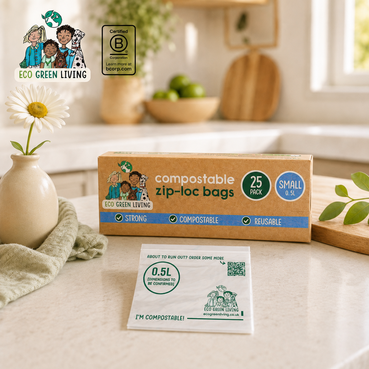 A box of Eco Green Living compostable zip-loc bags, 25 pack, small size, displayed on a kitchen counter next to a daisy in a vase and a compost confirmation card.