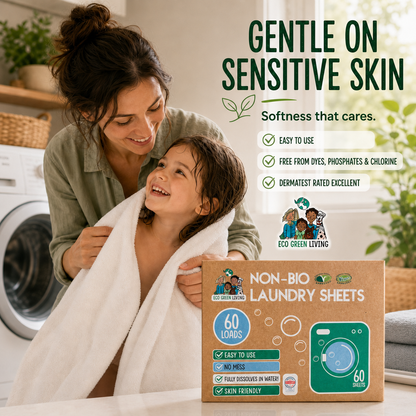 A woman and child wrapped in a white towel smile in a laundry room while a box of Eco Green Living Non-Bio Laundry Sheets is shown in the foreground. Text on the image highlights gentle on sensitive skin benefits.