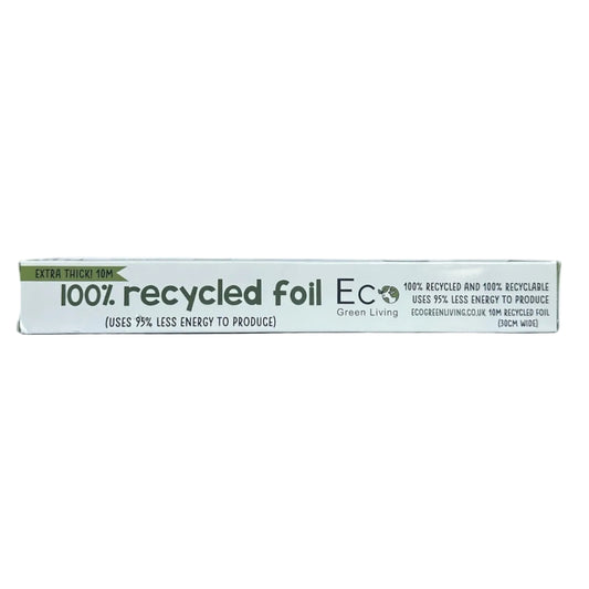 A long, narrow white box for '100% recycled foil Eco Green Living' with black text and a small green banner, photographed against a plain white background.